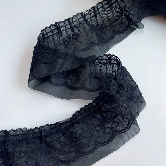 2 layer Black lace trim on a white background