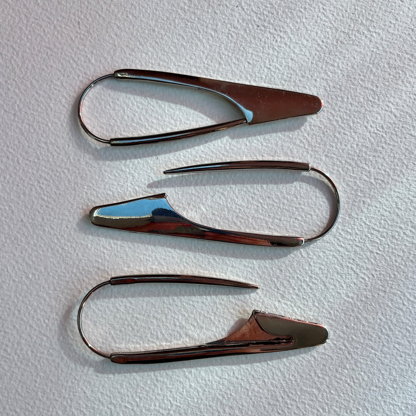 A fun and unusual scarf or shawl pin. Ideal for fastening open weave scarves and blankets, skirts or wearing as a statement brooch.