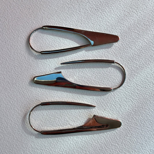 A fun and unusual scarf or shawl pin. Ideal for fastening open weave scarves and blankets, skirts or wearing as a statement brooch.