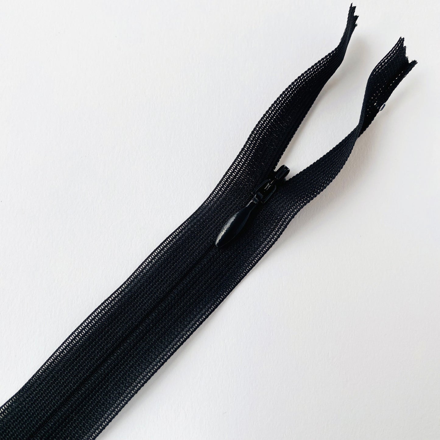 Lightweight black concealed zip, dress length invisible zip