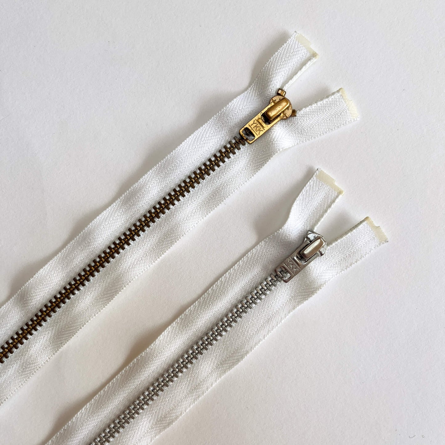 White YKK #4.5 Open End brass teeth Zip, 100cm length YKK jeans zip with gold and brass metal teeth and auto-lock puller - Kleins Haberdashery