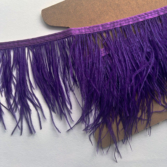 10cm deep Real ostrich feather fringe trim on a Satin ribbon for easy attachment. Would look incredible added to a jacket as a statement cuff!  Ideal for dressmaking, crafts, millinery, costumes, hat making, fascinators, bridal accessories, headpieces, bags.