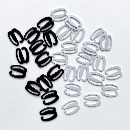 12mm Metal Detachable Hooks for lingerie and swimwear  Detachable Lingerie G Hooks, or swan hooks, are used for creating detachable straps bras, lingerie, suspenders and swimwear, but also great for front fastening bra closures, halter necks and to fasten bow ties! Suitable for use with a 12mm wide strap.