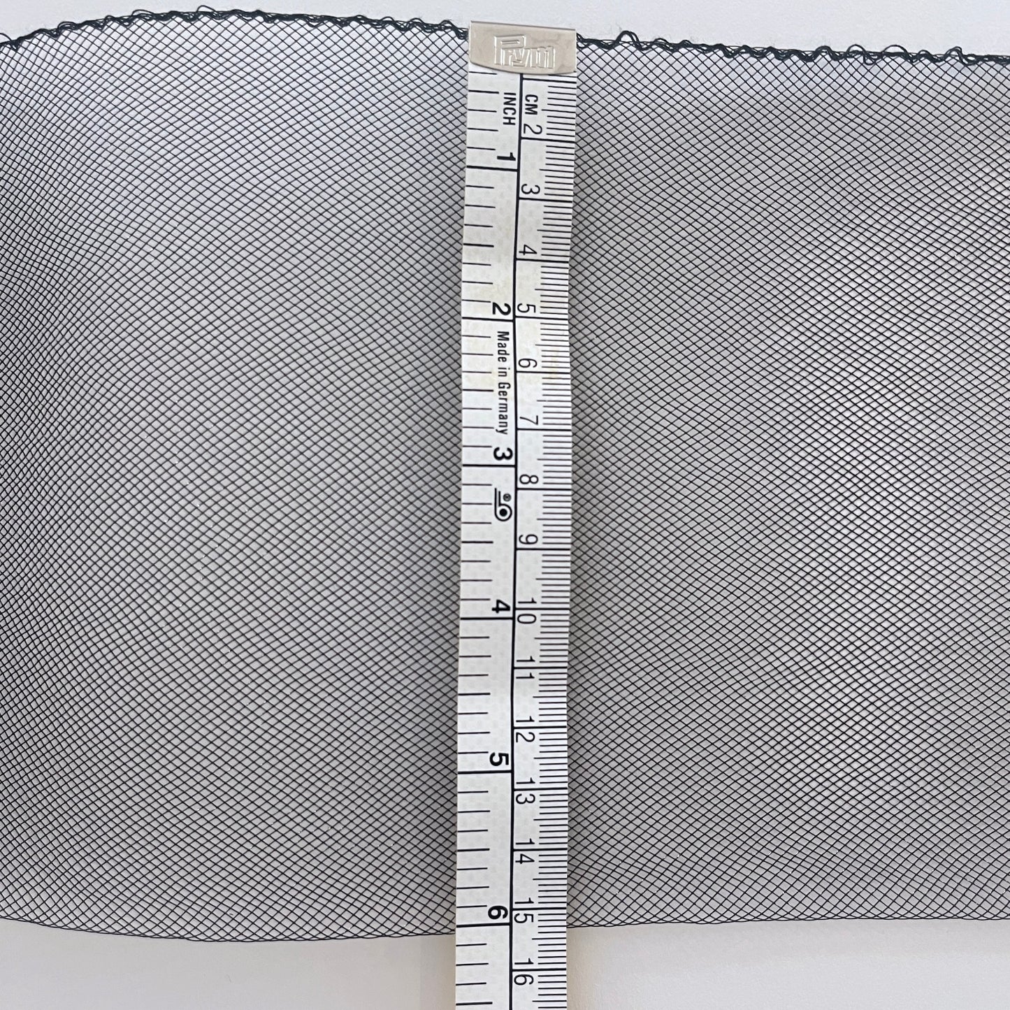 15cm, 6" wide Horsehair braid, also know as crin or crinoline, threaded on one edge for gathering and shaping. Used to stiffen hems, giving flexible shape, support and structure where needed especially for bridal wear, evening wear, prom dresses, petticoats, theatre costumes, dance wear and often used for hat making.