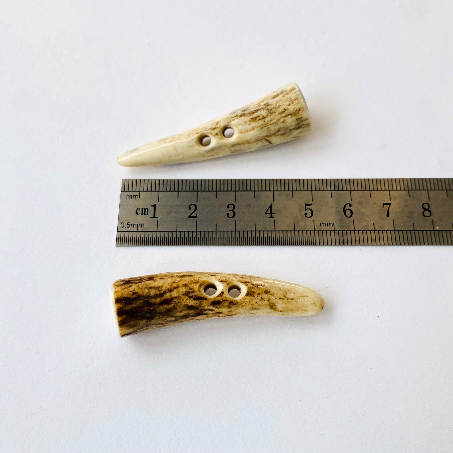 Puntas de palanca de 2 orificios de cuerno de ciervo de 50 mm