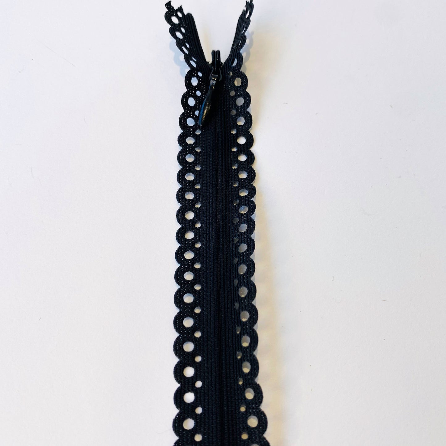 Lace Edged Invisible, Concealed zippers - 70cm long fancy dress zips, lightweight black invisible zips with scalloped edge tape and laser cut circle design