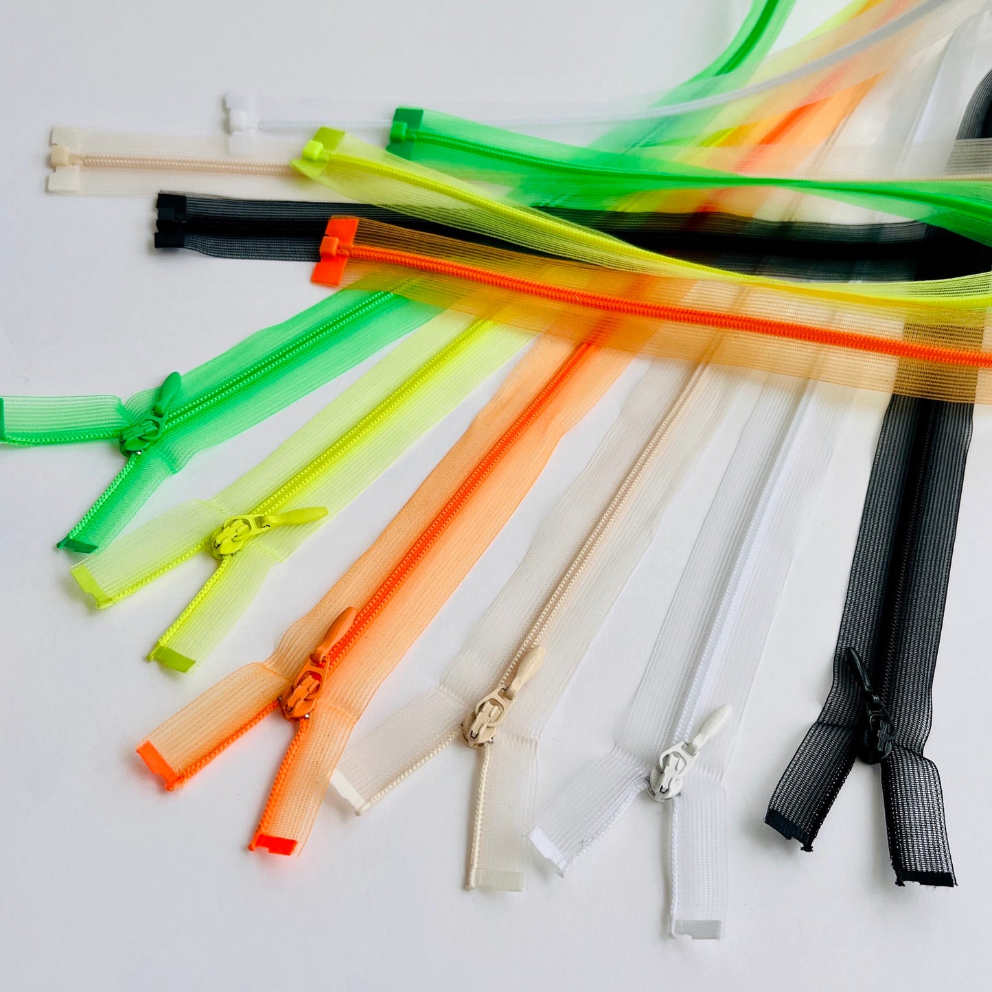 Lightweight open ended nylon zip - 100cm length. Super long open ended lightweight zips in 6 colours.