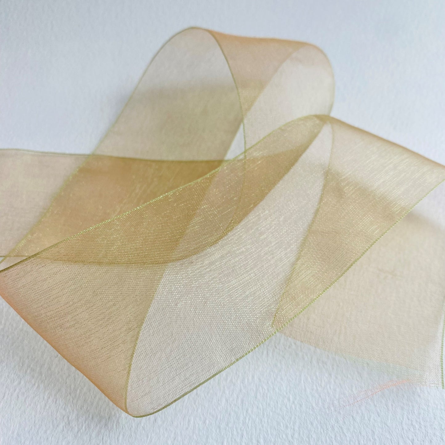 50mm Chiffon ribbon by MOKUBA A luxurious soft sheer chiffon ribbon trim by Mokuba, which comes in 6 beautiful colours. Col: Gold 01, Blue 02, Navy 09, Grey 15, Blush 16, and Red 23.