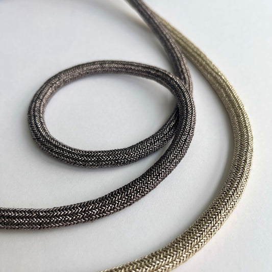 Metallic Woven Tubular Braid Add a little luxe and glamour to any outfit with our fancy cord! Perfect for hoodies, joggers, drawstrings, belts, costume and theatre design, upholstery and crafting.