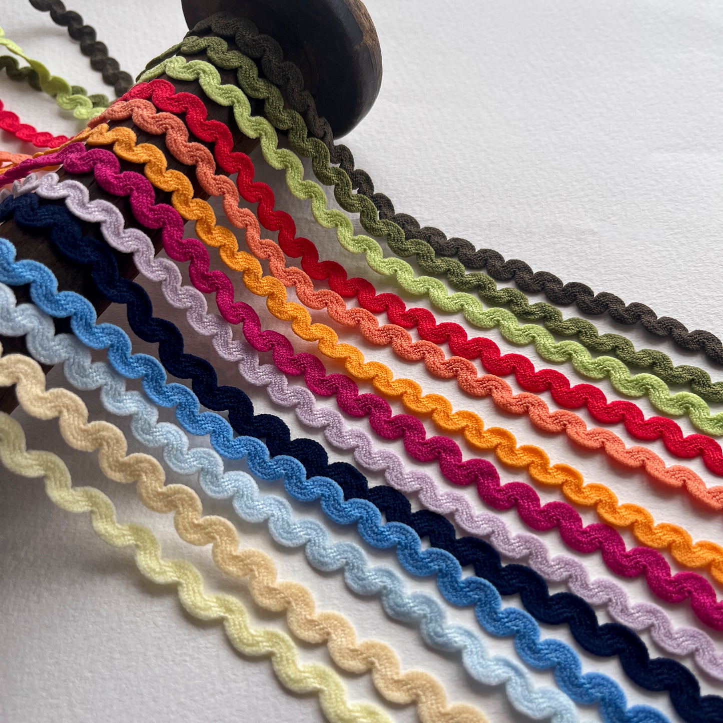 This stretch ric-rac is perfect to add a unique trim to your lingerie and garment makes, or use to embellish cards and papercrafts. Available in 13 delightful colours
