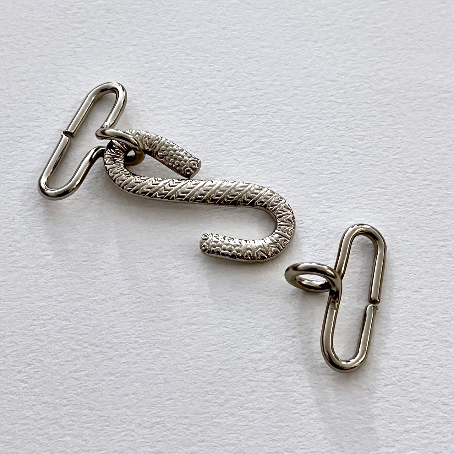 S ‘snake’ belt buckle