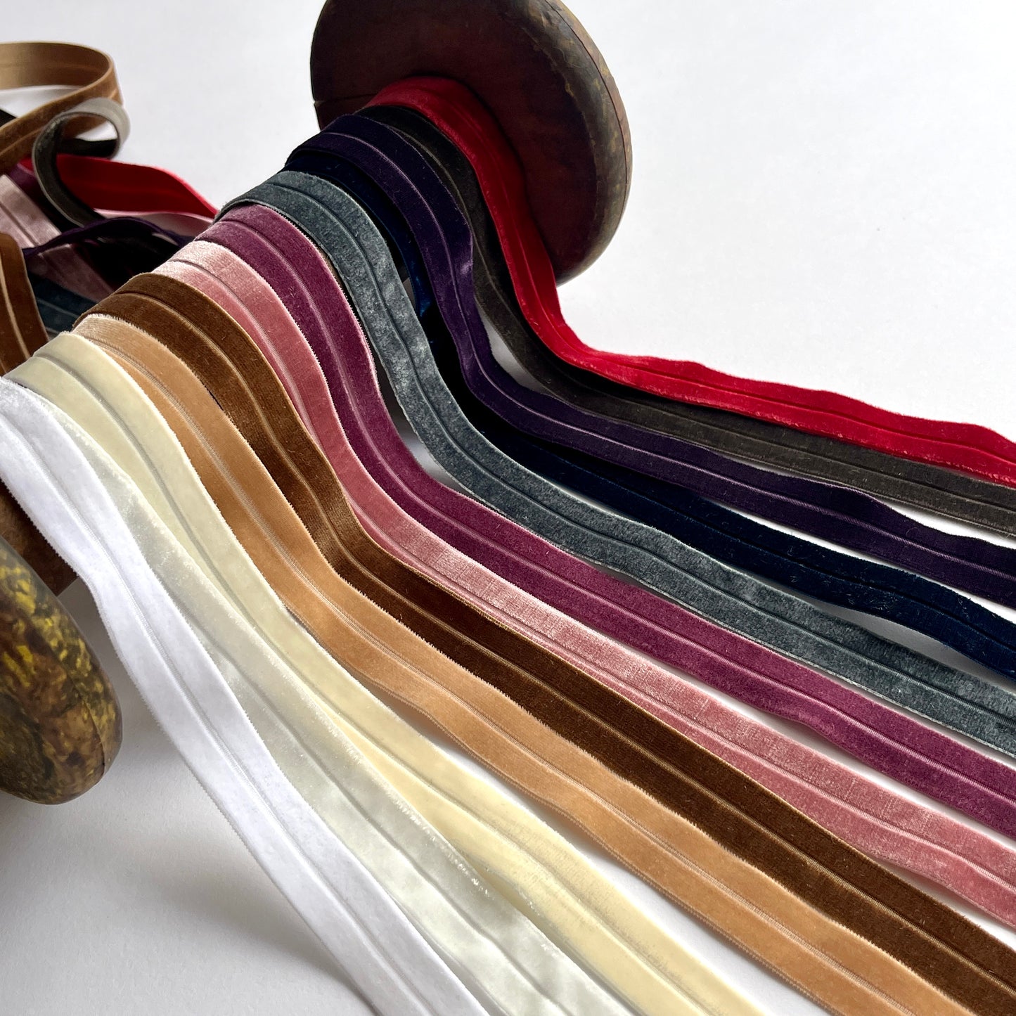 Stretch Velvet fold over elastic (FOE). 16mm wide with a centre fold. Use as a binding for stretch fabrics, for straps, lingerie and underwear making, headbands, hair ties, dancewear and active wear projects.