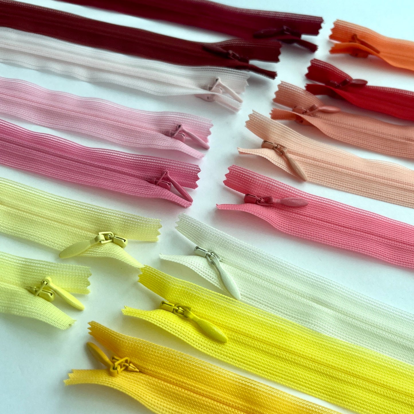 Ykk Lightweight Invisible zip in yellow/orange/red/pinks - 66cm (26")