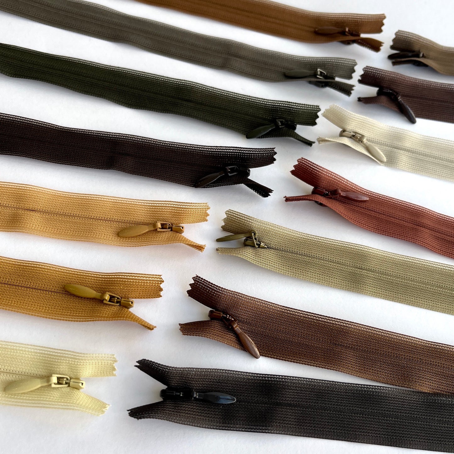 YKK Lightweight Invisible zip in Brown shades - 66cm (26") length, Lightweight invisible, concealed zip with closed-end for dressmaking.