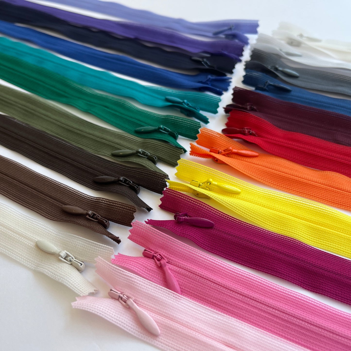 YKK Lightweight Invisible zip in - 23cm (9") length, Lightweight invisible, concealed zip with closed-end for dressmaking.
