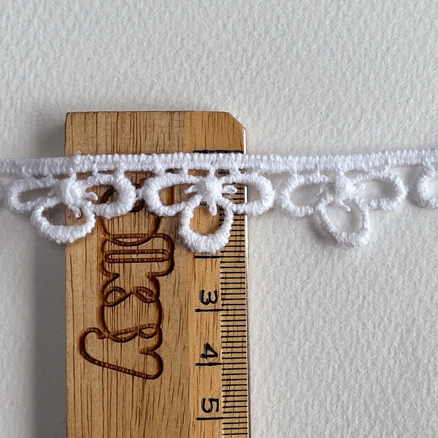 Vintage Trefoil Cotton guipure lace trim with a matt finish, we believe to be from the 1980s