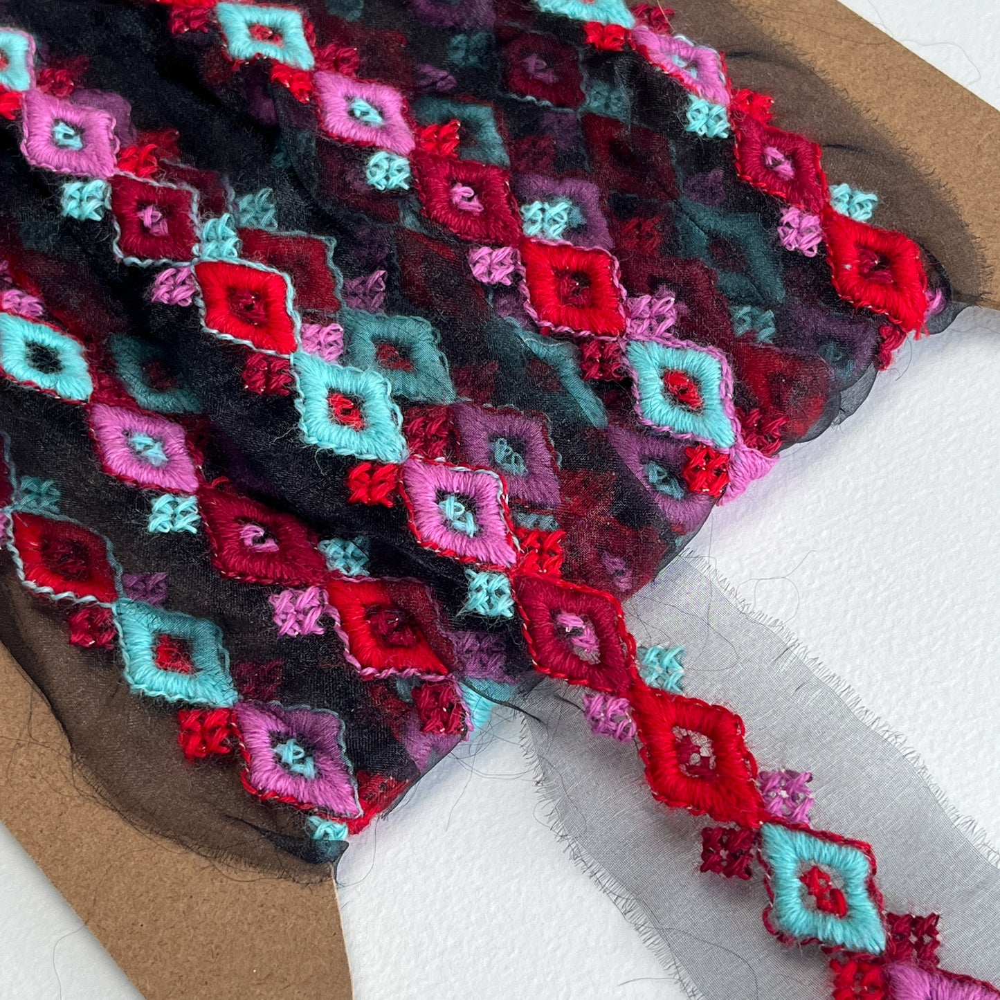 Geometric folklore embroidered trim. Beautiful embroidered trim with geometric 'folklore' design.