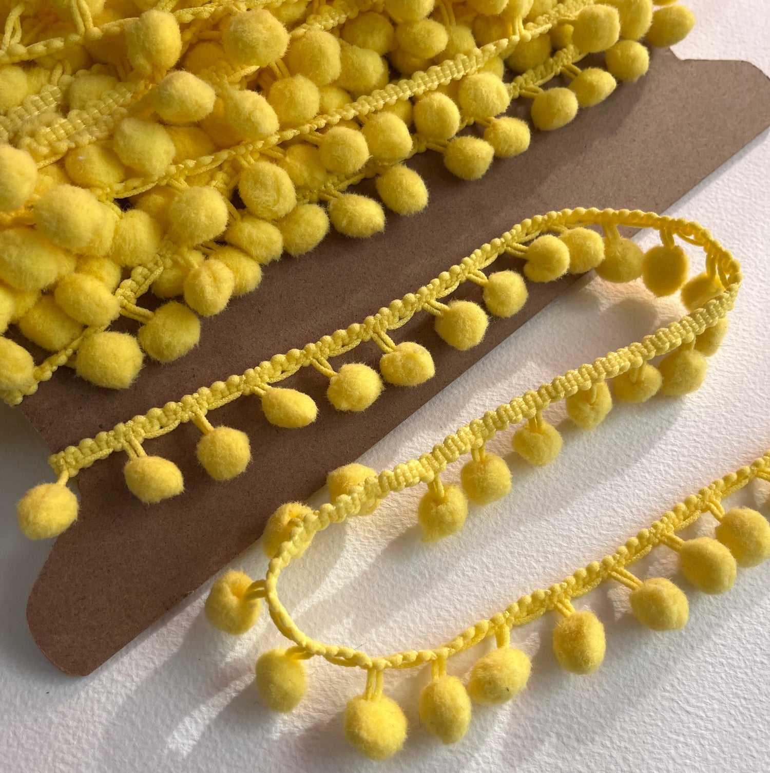 Garniture à pompons