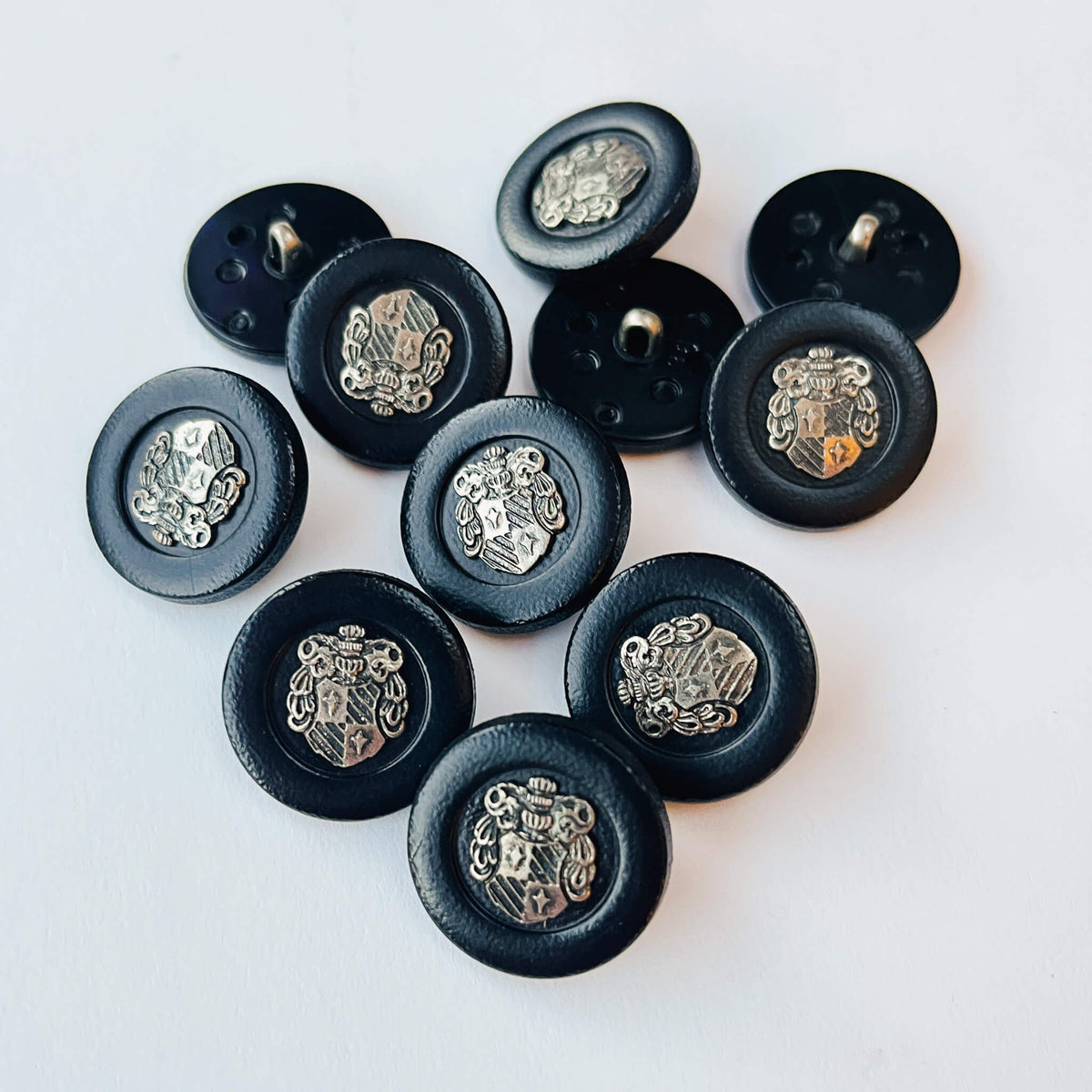 23mm Crested Military Button with heraldic  Coat of Arms Shield design on white background