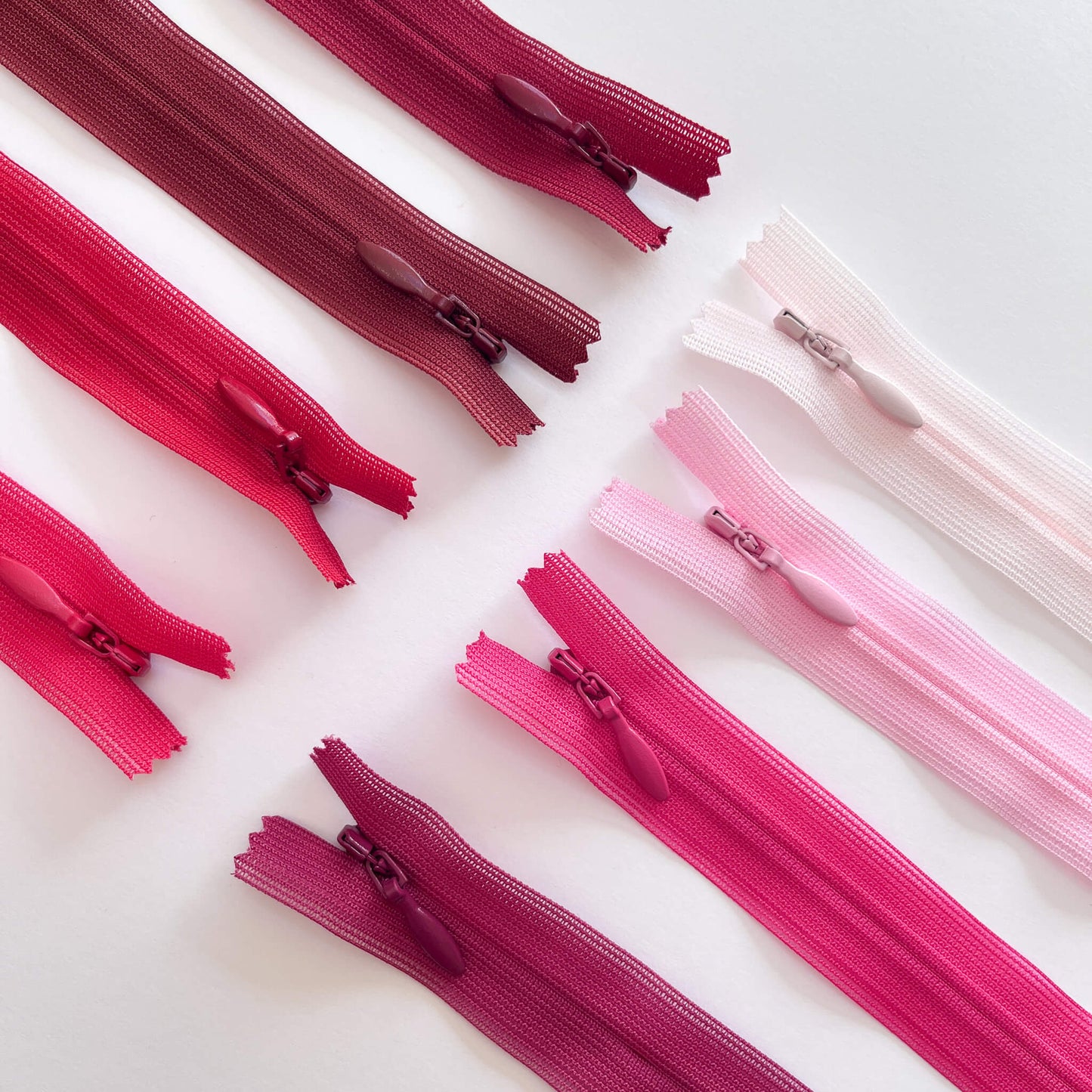 #2 Lightweight Invisible zip By YKK - Red & Pink shades - 66cm (26") length - Kleins Haberdashery