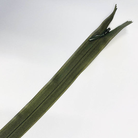 Green zipper on a white background