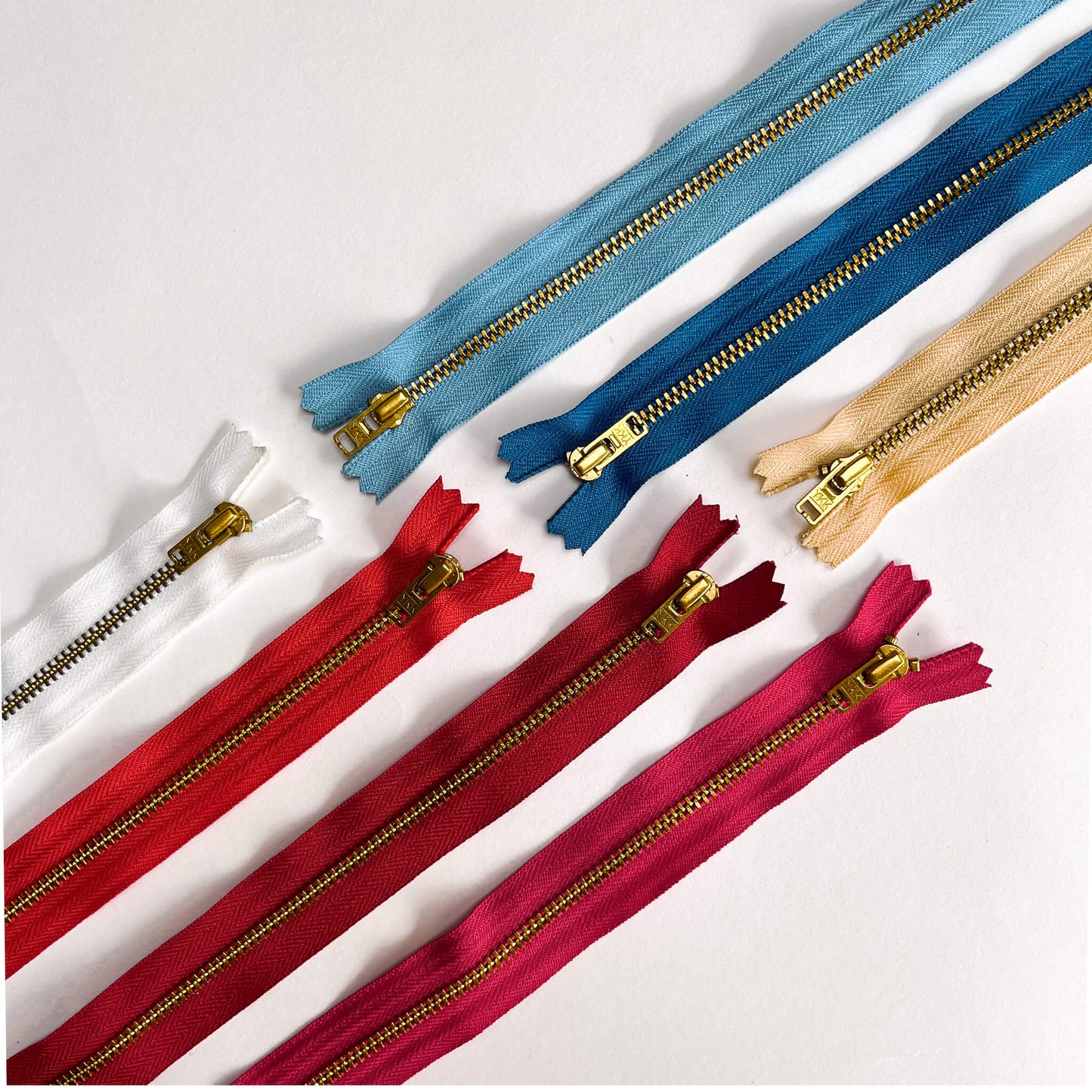 #4.5 YKK Closed End Zip - 70cm length with Brass coloured teeth, in various shades
