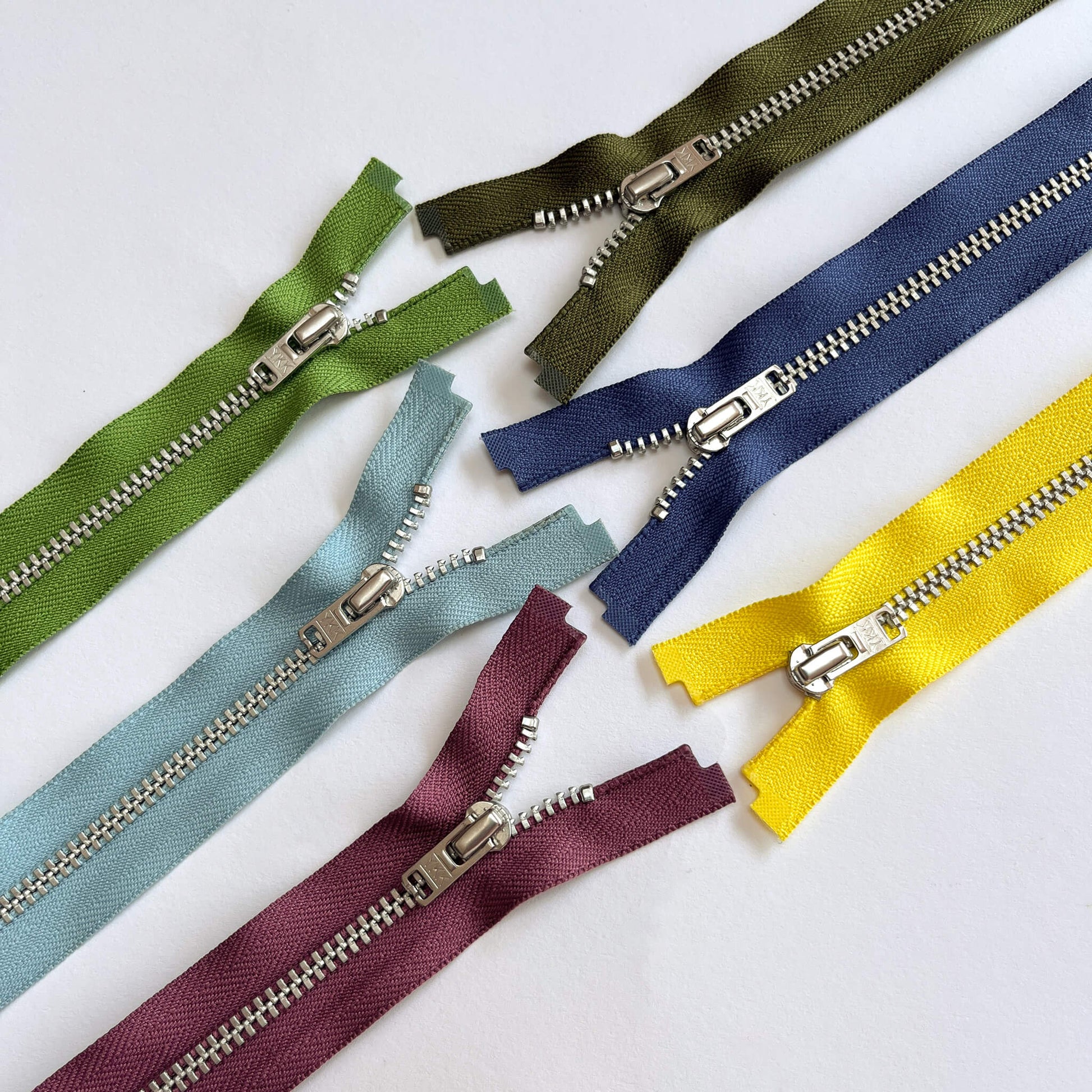 YKK #4.5 Open End SILVER Zip,70cm length  YKK  jeans zip with SILVER metal teeth and auto-lock puller in various shades -  Kleins Haberdashery