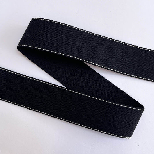 40mm recycled cotton webbing showing plain and stitched sides