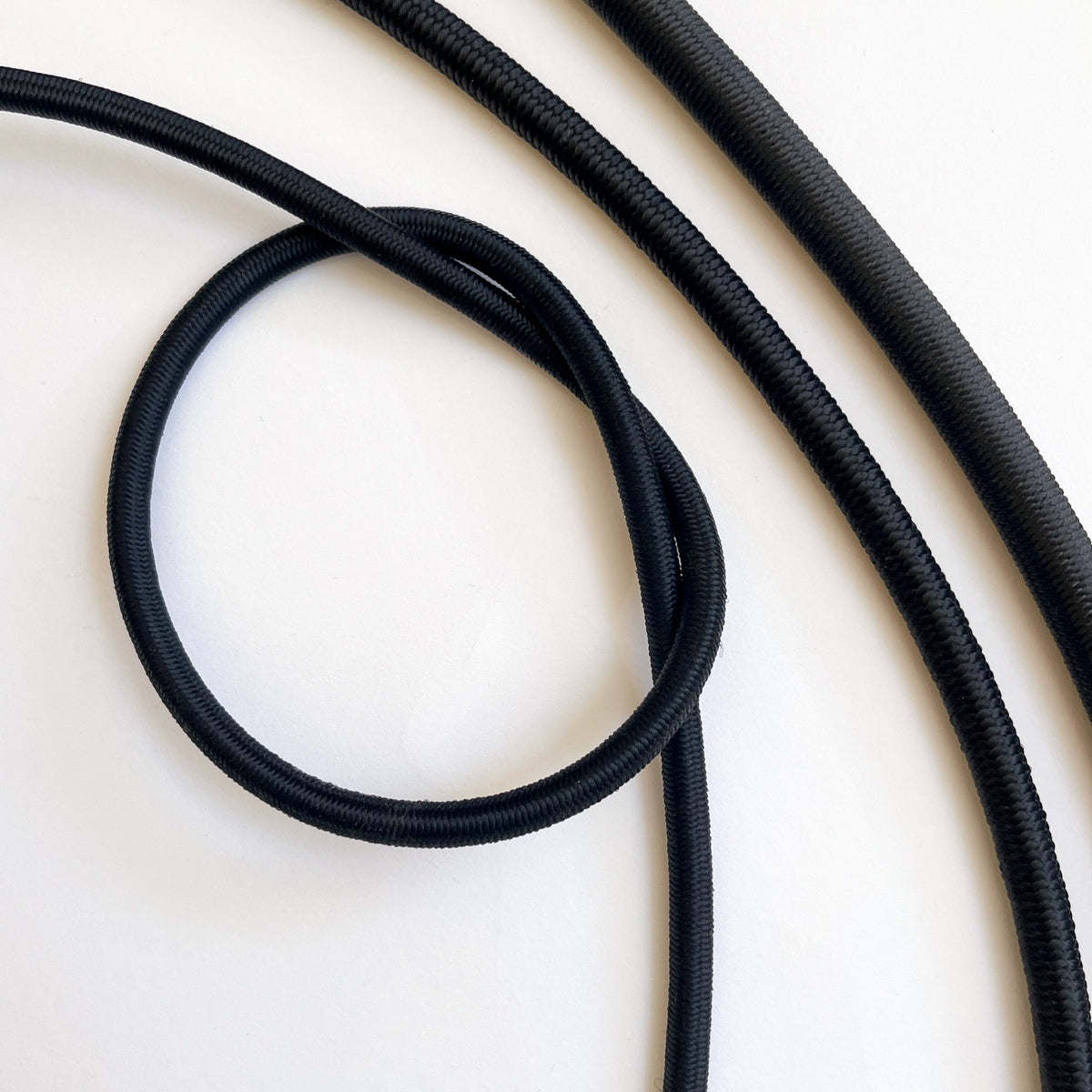 Black elastic shock cord in 6mm, 8mm and 10mm widths