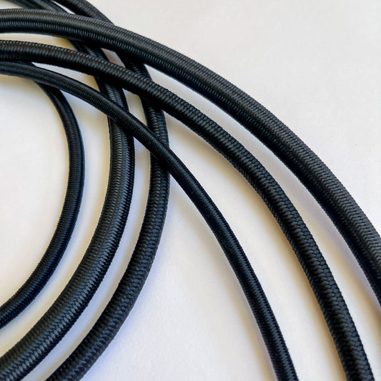 close up of Black elastic shock cord in 6mm, 8mm and 10mm widths