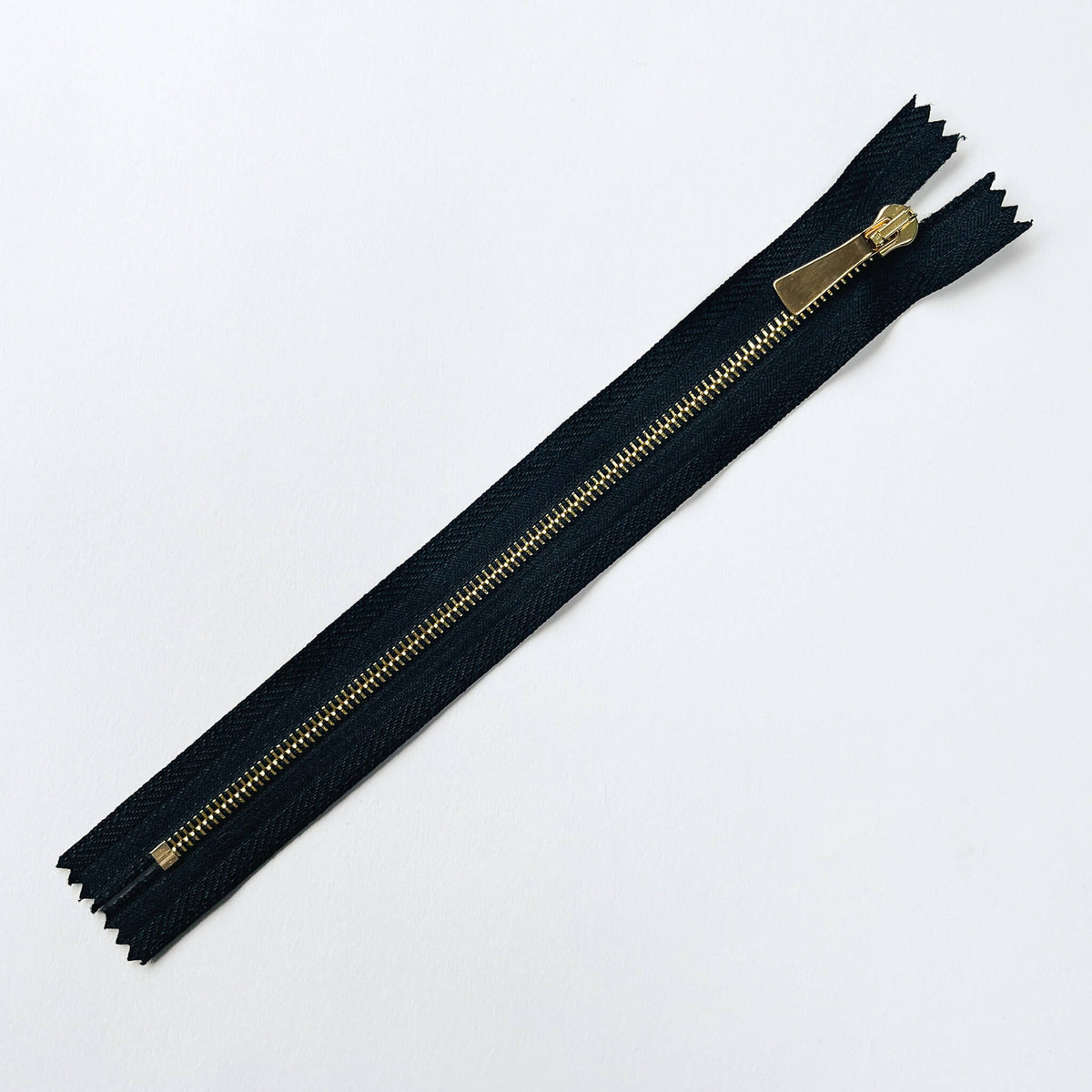 #3 Slim Profile Closed End Zip with black tape and Gold teeth & puller - 20cm length