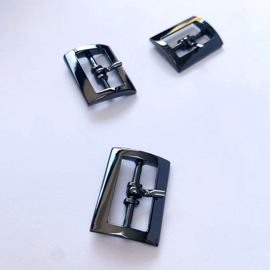 Chrome Gunmetal Rectangle Prong Buckle - 25mm -Three black metal buckles on a white background