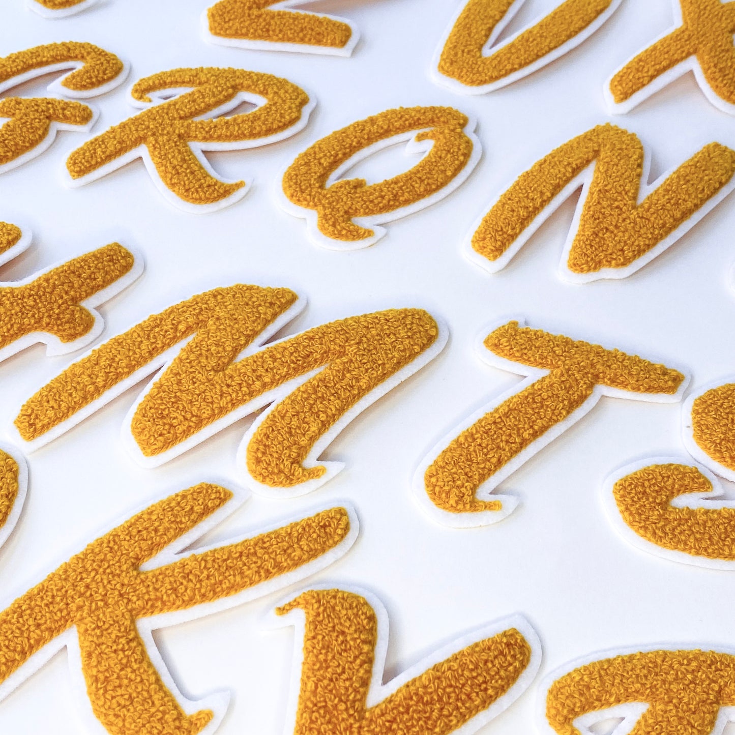 Gold iron on letters