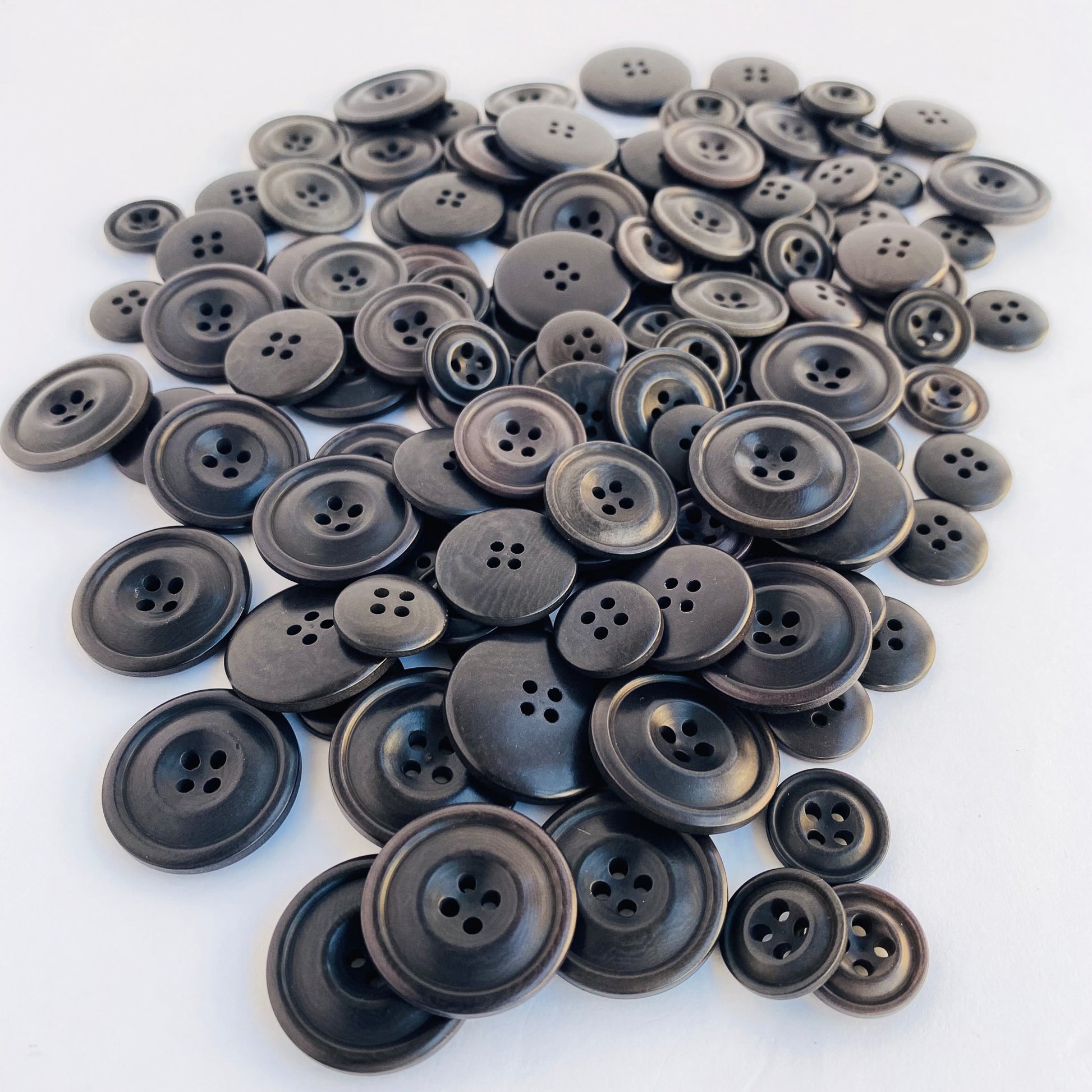 Grey corozo suit buttons