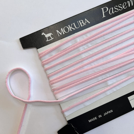 Mokuba raspberry pink piping cord
 on a white background