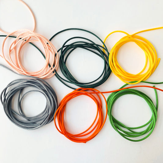 2mm satin rat tail cord in mixed shades of peach, yellow, green and grey