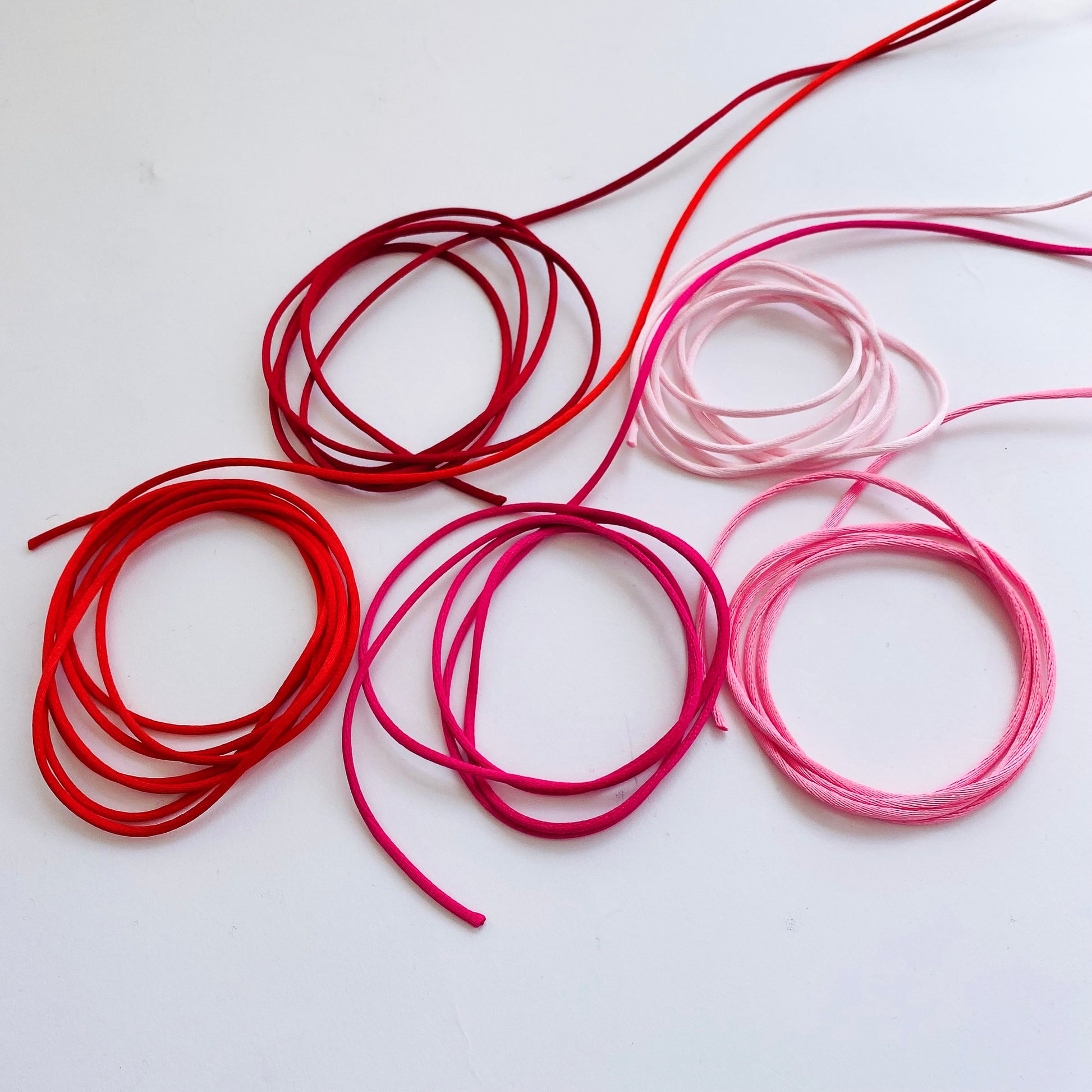 2mm satin rat tail cord in red and pink shades