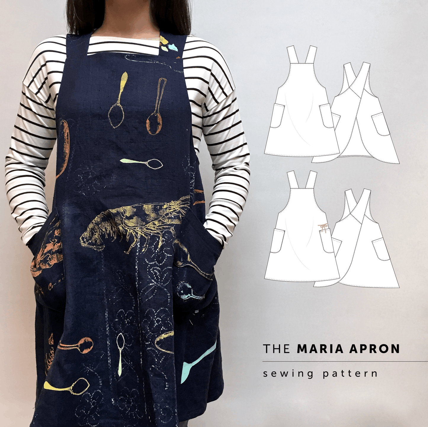 Maria Apron sewing pattern made in blue linen, cross-back apron with large patch pockets