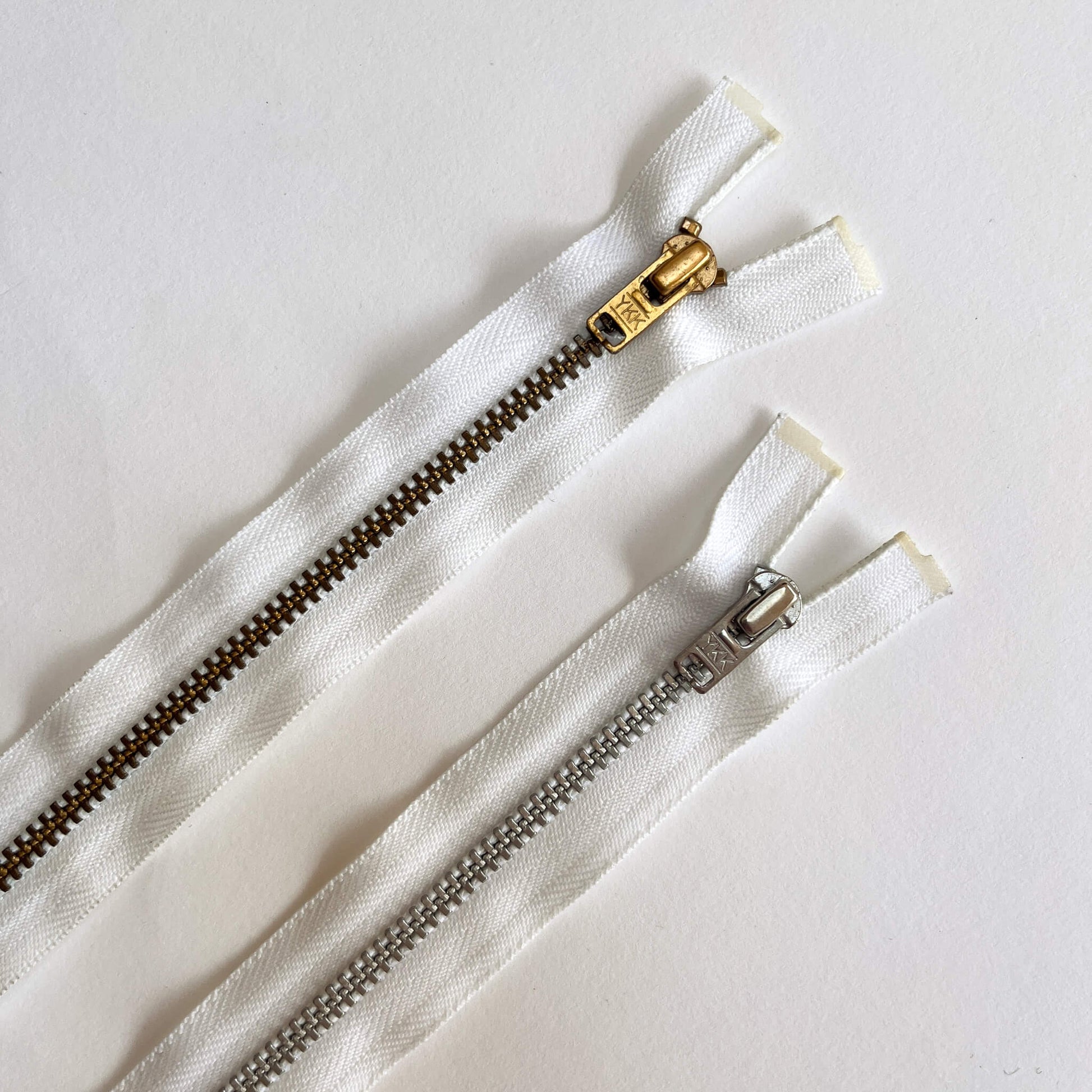 White YKK #4.5 Open End brass teeth Zip, 100cm length  YKK  jeans zip with gold and brass metal teeth and auto-lock puller -  Kleins Haberdashery