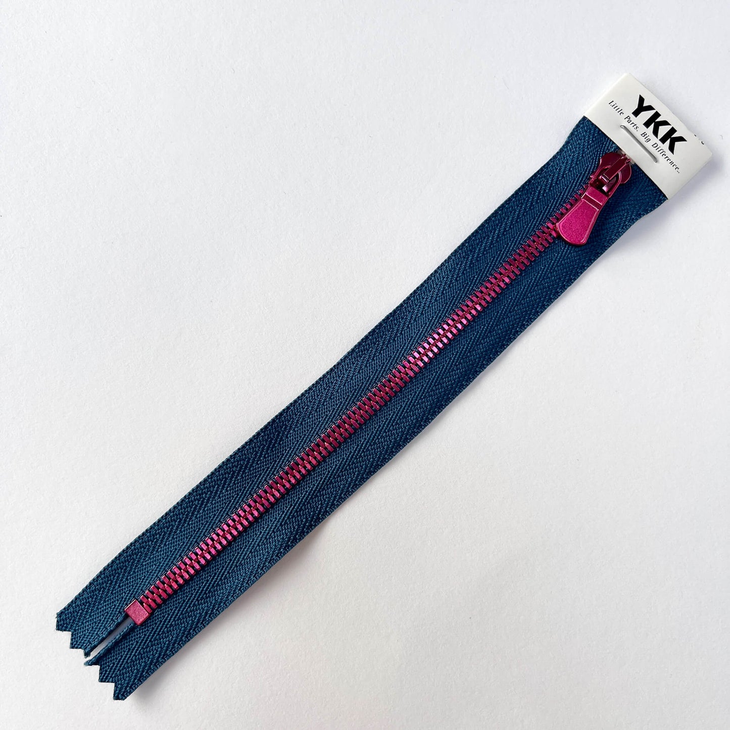 YKK EXCELLA lightweight No. 3 jeans zip in Blue with polished pink metal teeth and puller. 17cm closed-end zip, suitable for jeans, trousers, bags and denimwear