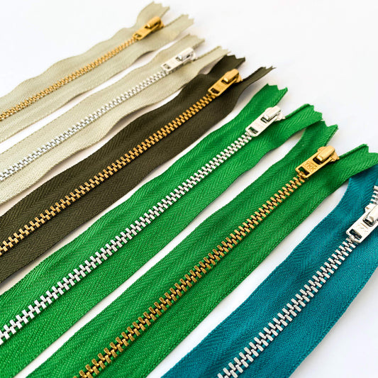 YKK  jeans zip with metal teeth and auto-lock puller in various shades of green