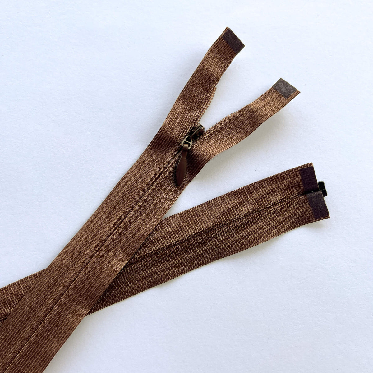YKK Light weight open ended invisible, concealed, zip in brown