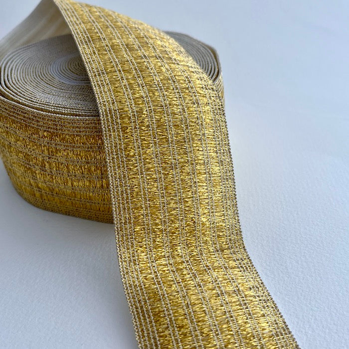 Live out your best disco dreams with these glorious lurex elastics! This stitched metallic elastic is perfect for adding a bit of sparkle and stretch to a waistband, cuff or elasticated belt. Can be worn directly against the skin as it is soft and non-scratchy on the reverse side.