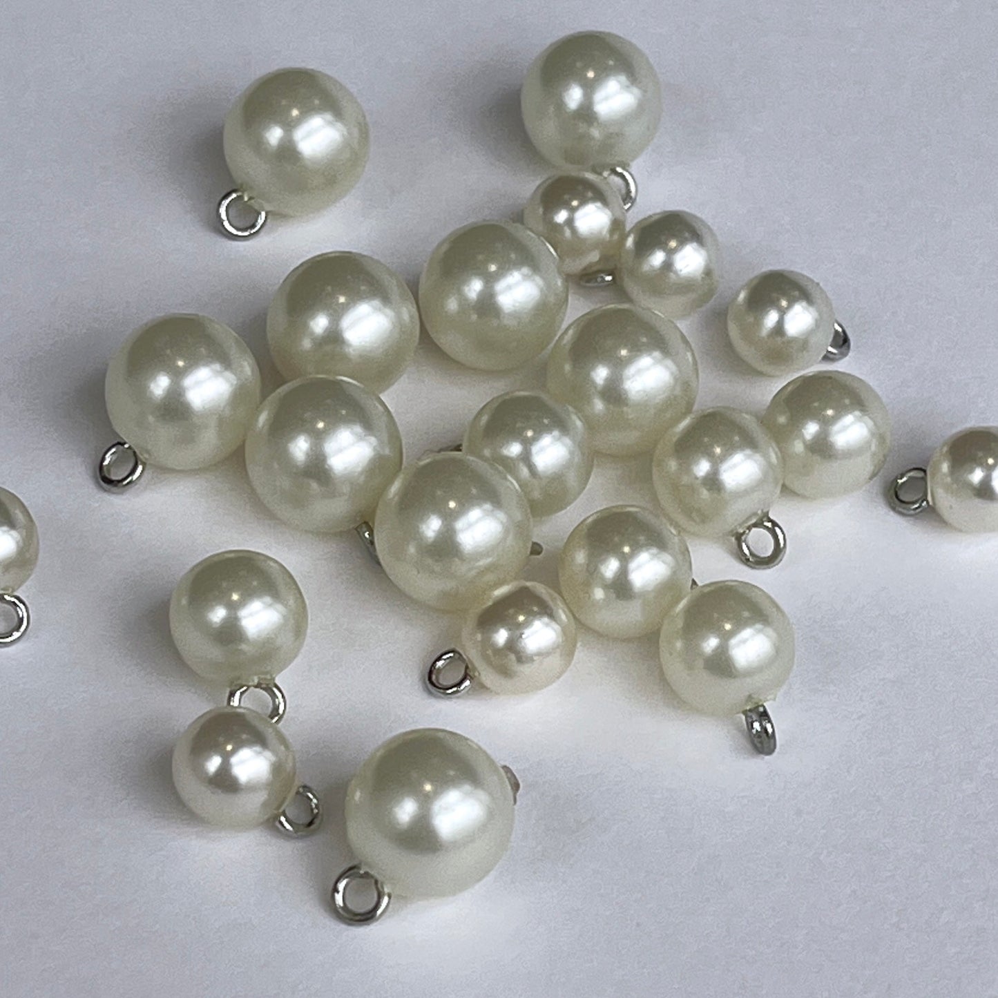 Pearl bridal ball buttons with metal shank perfect for bridal wear, baptism and Christening gowns or even a fancy cardi! Available in either white or ivory and 3 sizes.