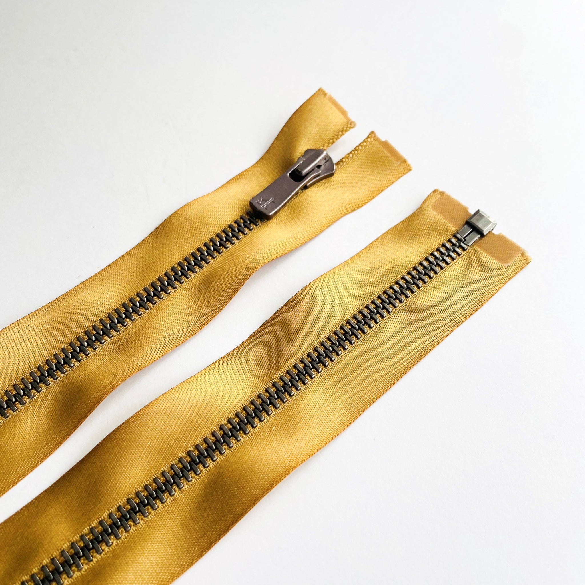 Luxury Gold Soft Satin Zip by YKK’s EXCELLA® – Kleins Haberdashery