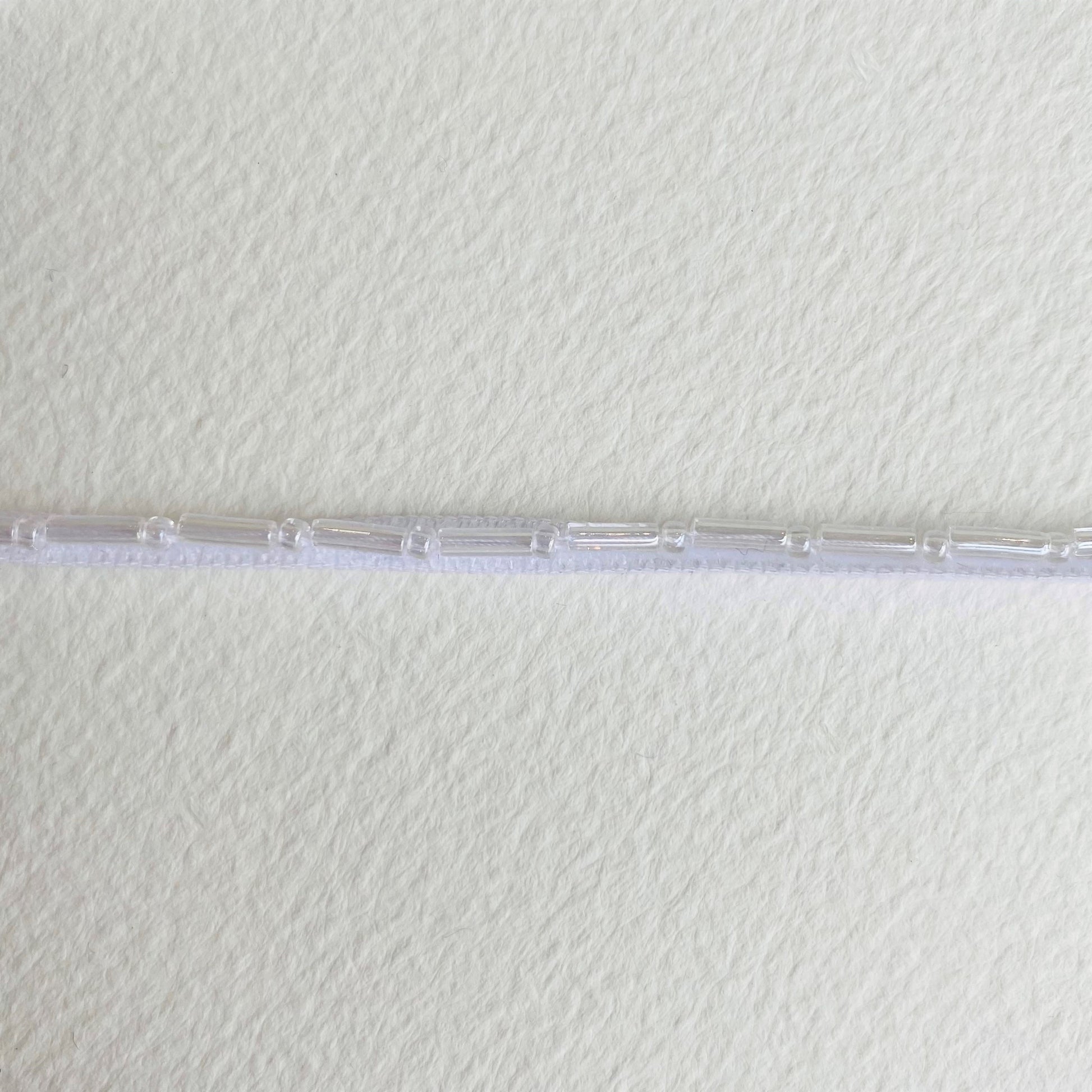 3mm Beaded Velveteen Ribbon by MOKUBA A beautifully soft beaded Velveteen ribbon trim by Mokuba that comes in two colours.
