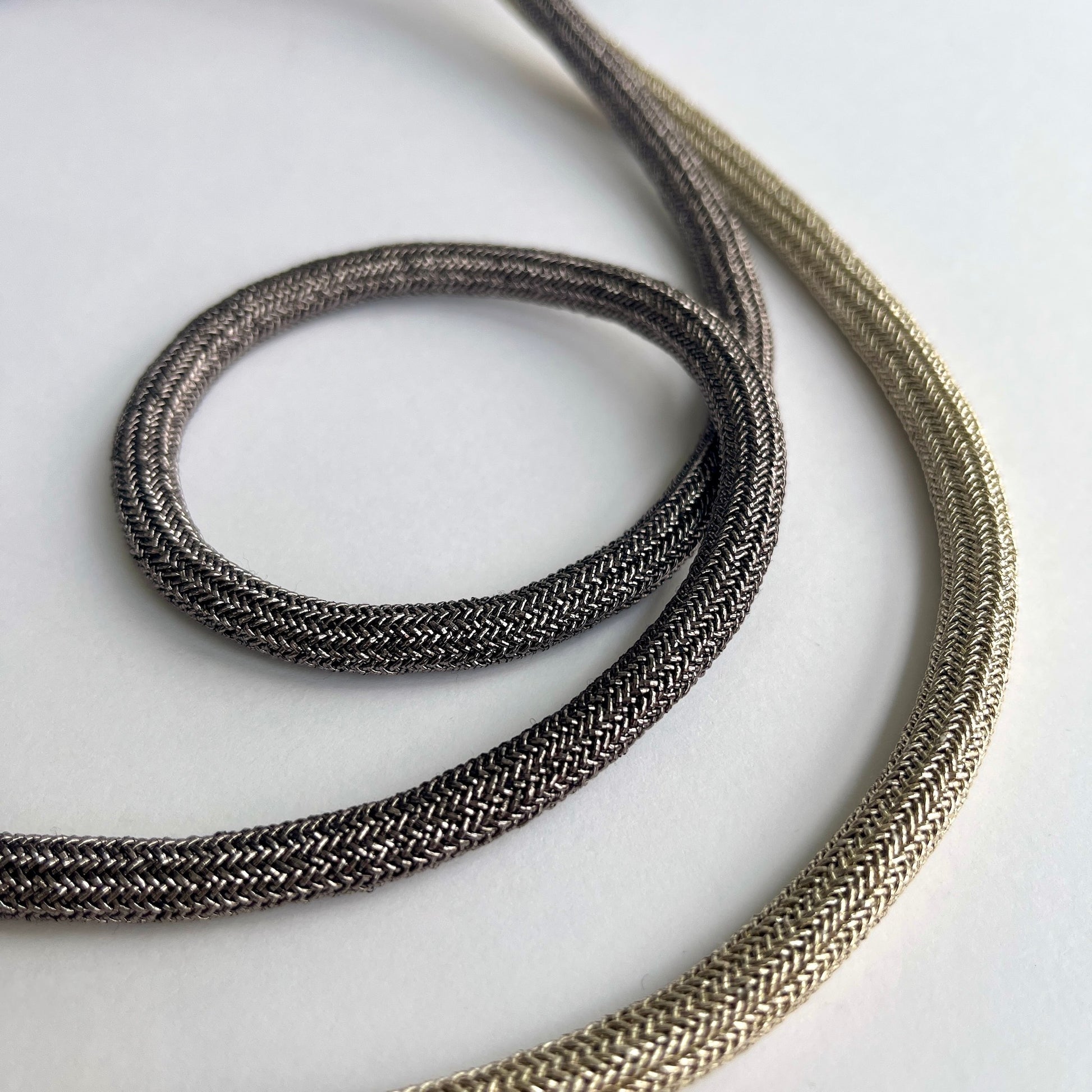 Metallic Woven Tubular Braid  Add a little luxe and glamour to any outfit with our fancy cord! Perfect for hoodies, joggers, drawstrings, belts, costume and theatre design, upholstery and crafting.