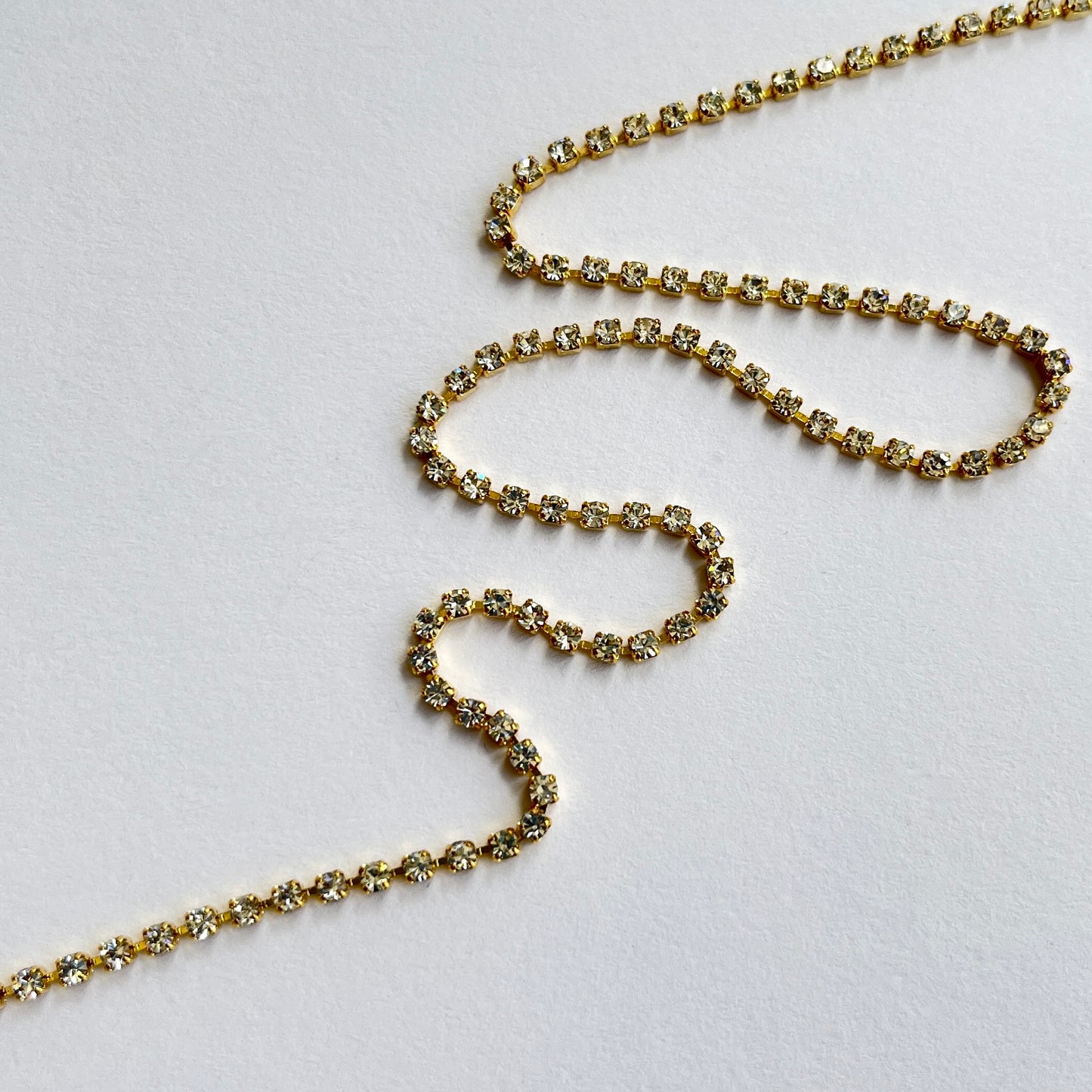 3mm wide delicate narrow rhinestone trim - premium high grade diamanté crystals set in a flexible metal chain casing