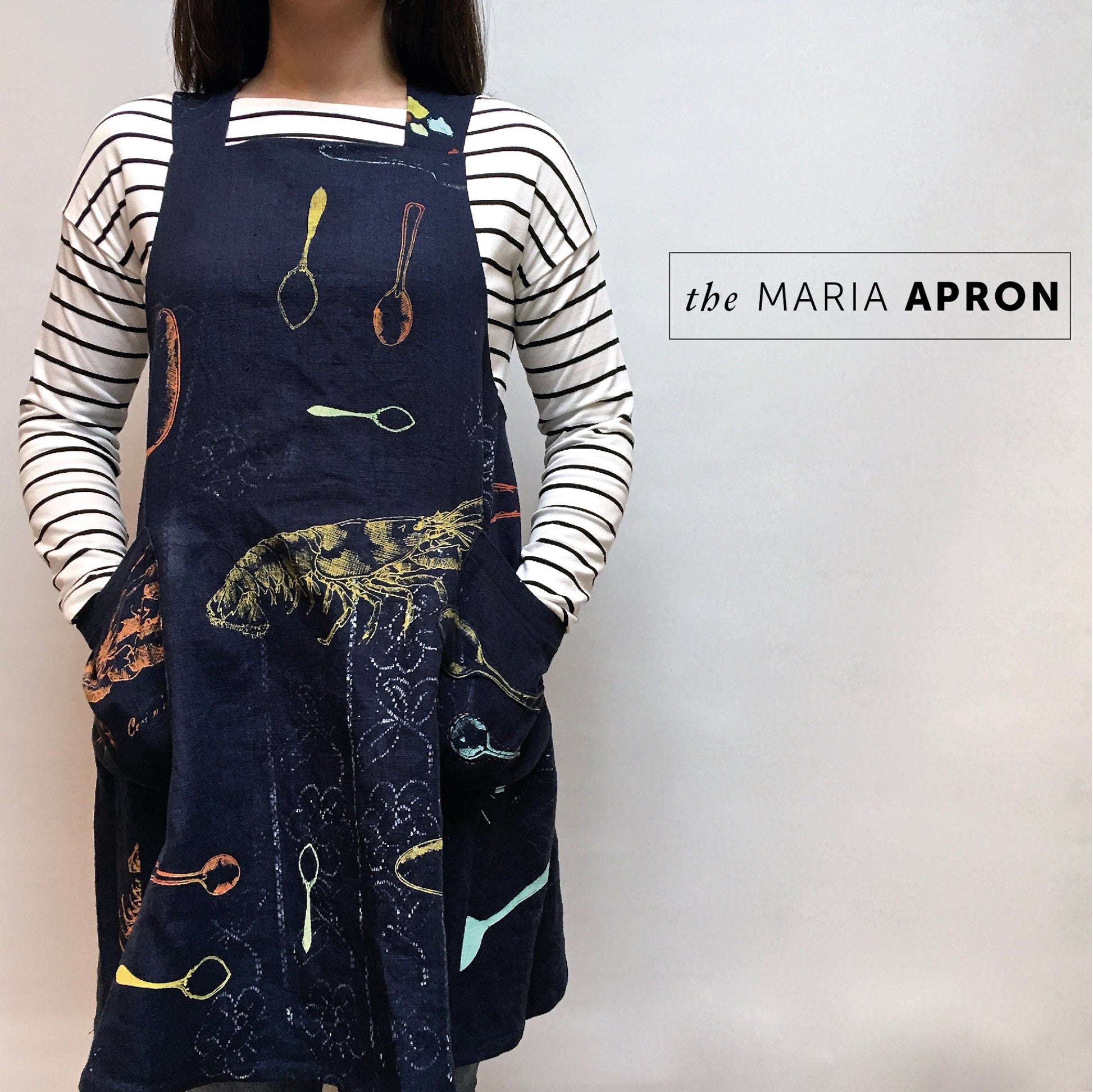 Maria Apron sewing pattern, cross-back apron with large patch pockets.