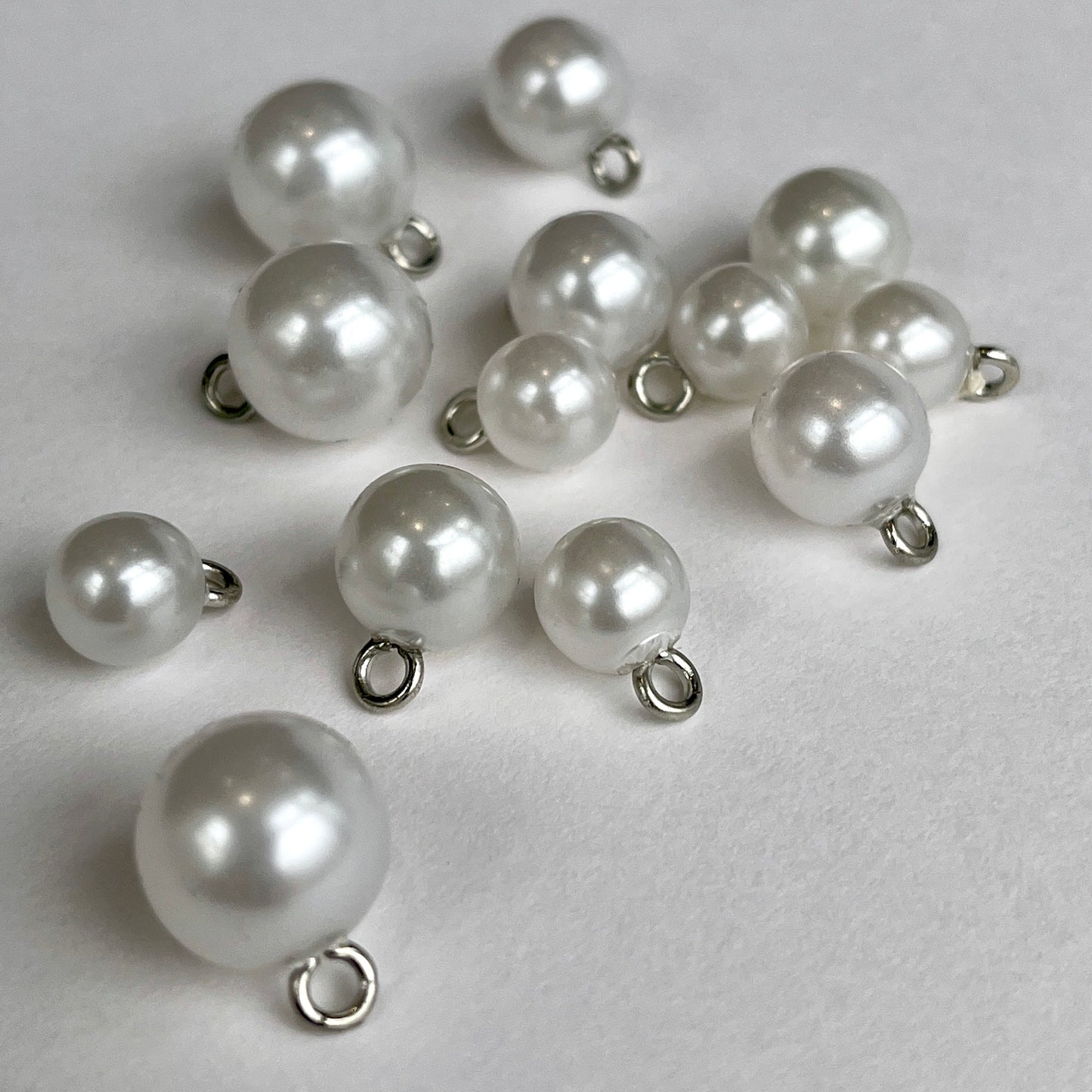 Pearl bridal ball buttons with metal shank perfect for bridal wear, baptism and Christening gowns or even a fancy cardi! Available in either white or ivory and 3 sizes.
